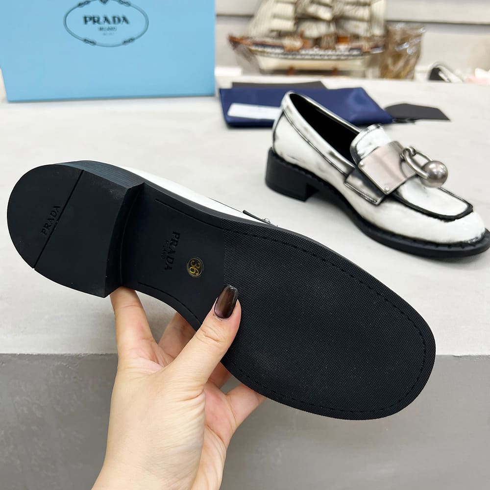 PRADA Brushed leather loafers with metal details